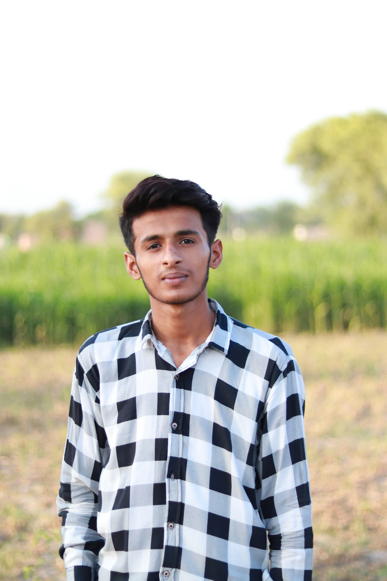 a man standing in the middle of a field