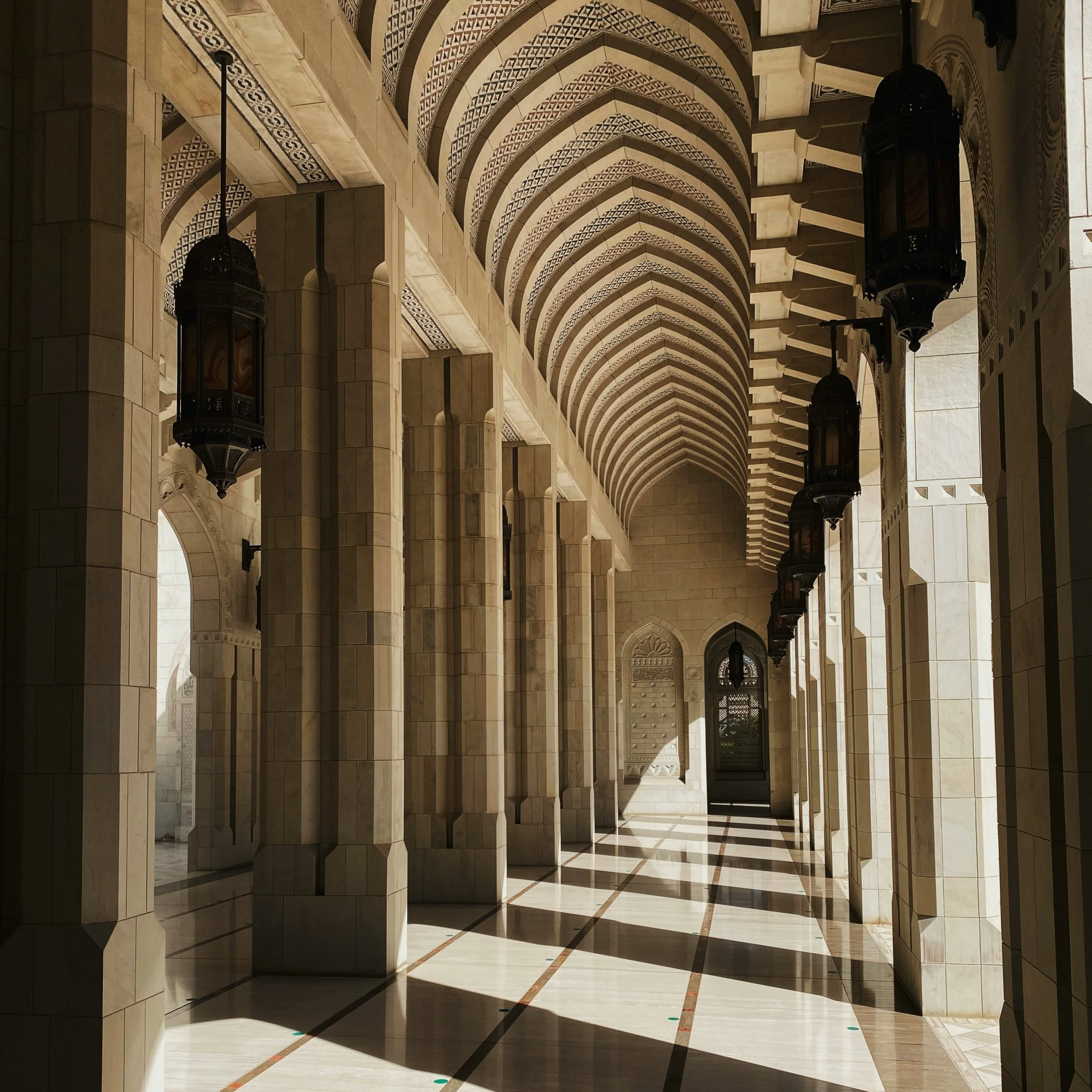 a view of a large hallway leading to a doorway