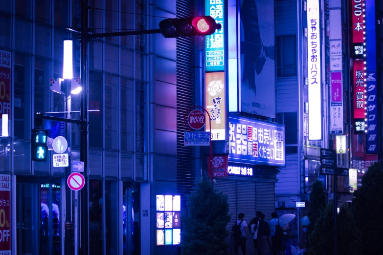 asian signs are lit up outside an establishment