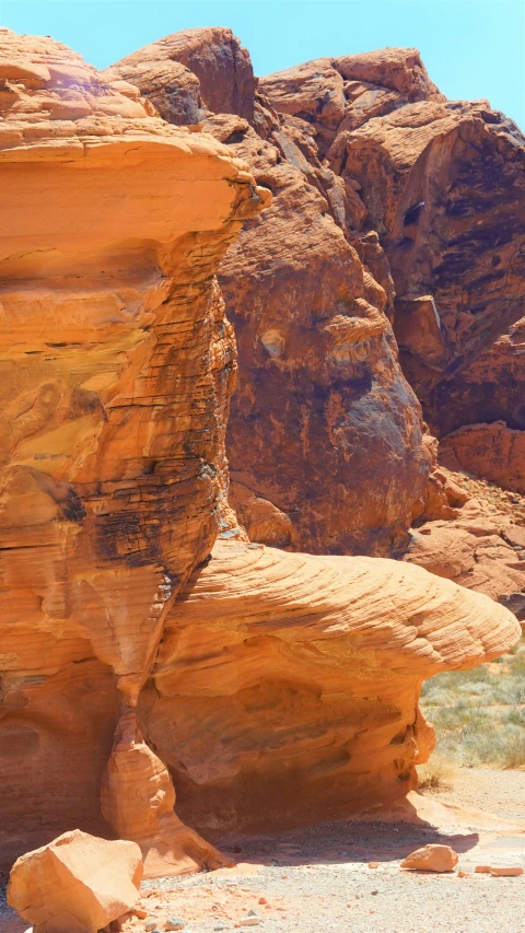 a brown rock formation that looks like part of a cave