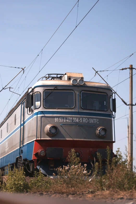 the train is riding along the tracks on its wheels