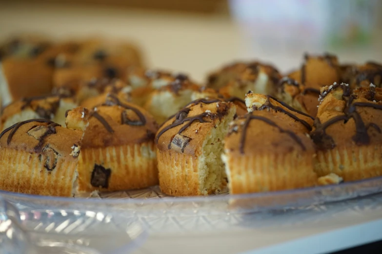 several different type of pastries on a glass plate