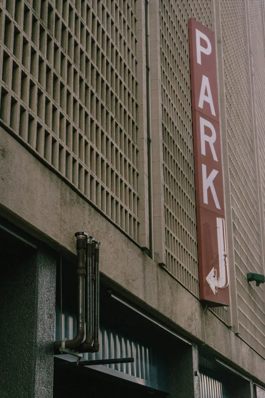 a sign is posted near some buildings