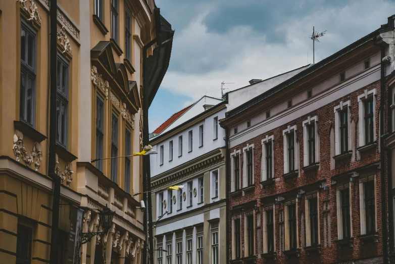 a row of brown buildings on a street