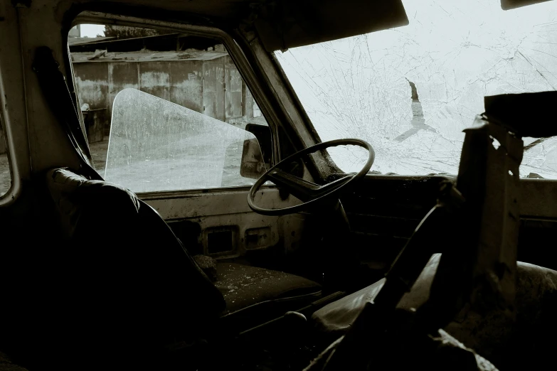 an old truck window, the inside and side of it