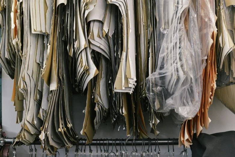 racks with several items hanging from them near the wall