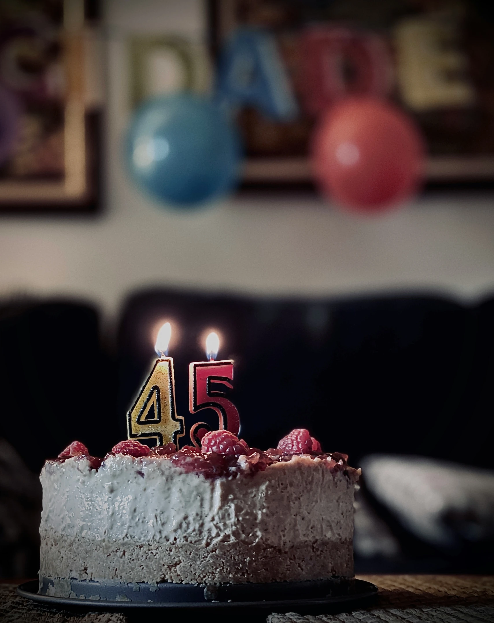 a cake that has candles on it that says 45