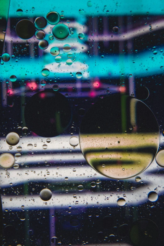 a close up view of rain droplets on a window pane