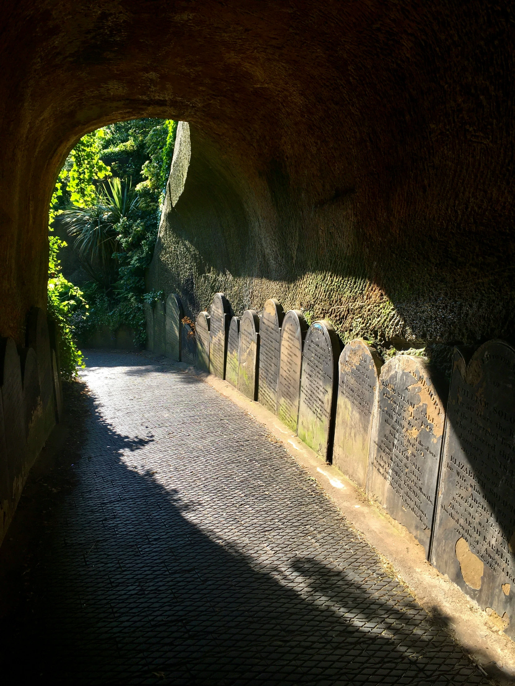 an archway is in the road outside