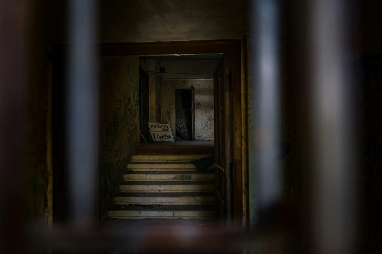 the stairway leads to an abandoned building