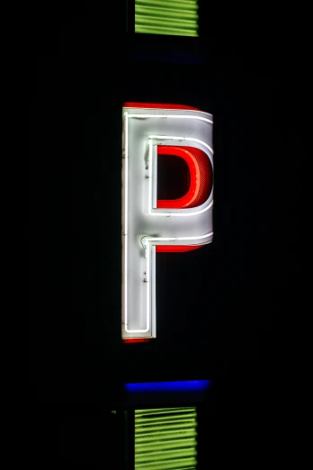 a letter p is seen lit up from above