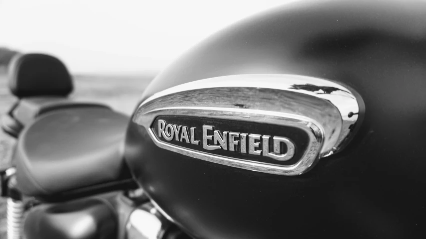 a close up view of a motor cycle with a small engraved