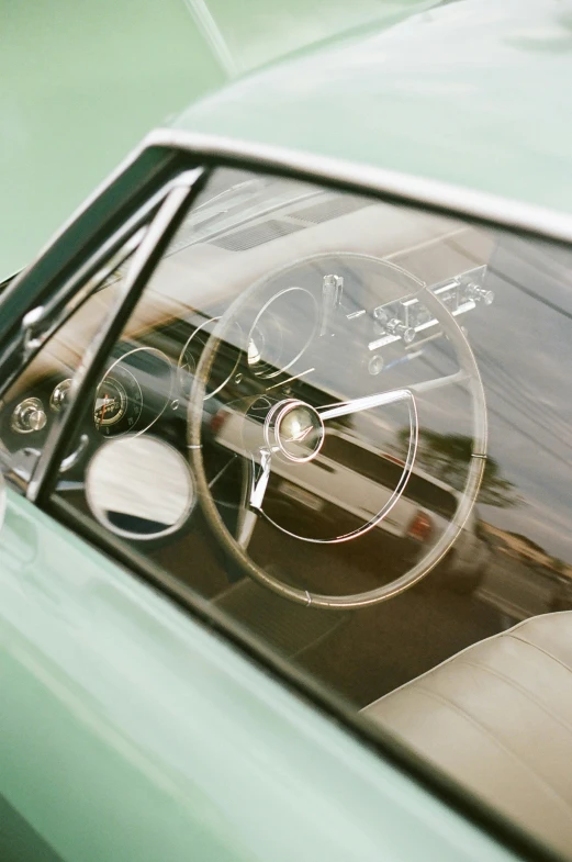 a vintage car with a rear view mirror on the back