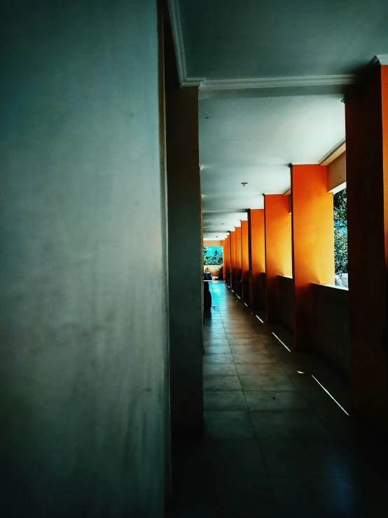 a long corridor between the hallway and the walls