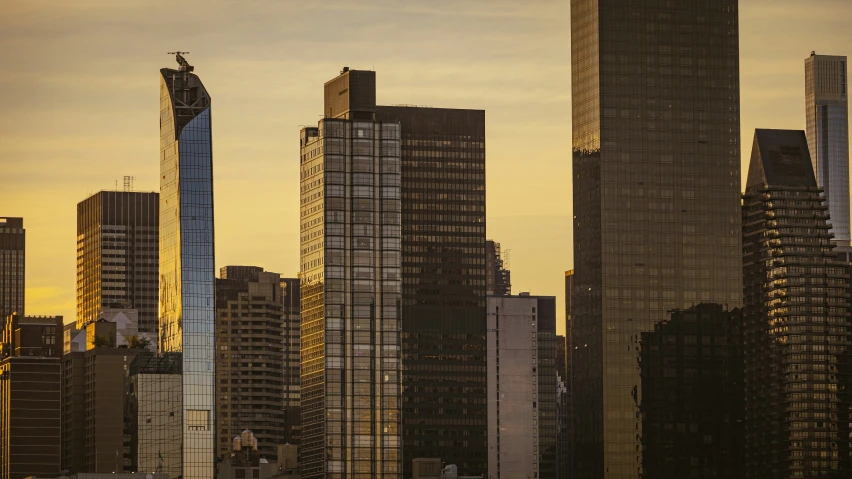 very tall buildings near the city at dusk