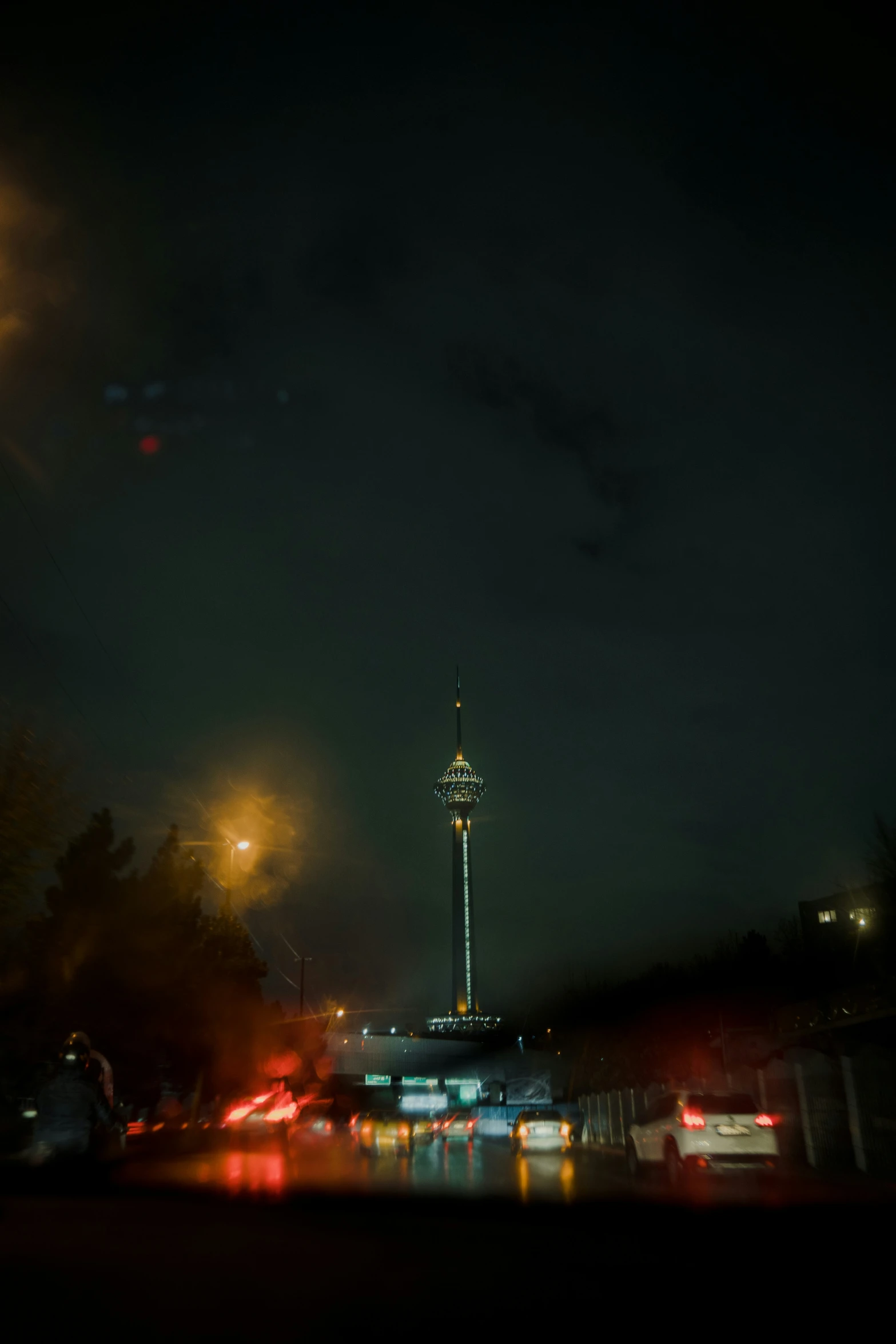 a blurry picture of a city at night