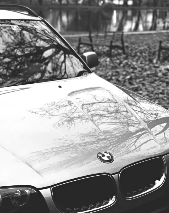 a black and white pograph of a bmw