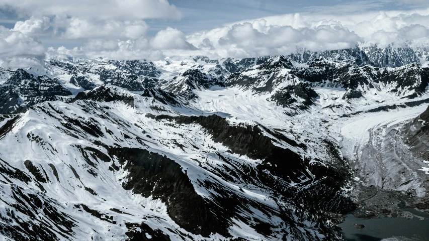 a snow covered mountain side in winter