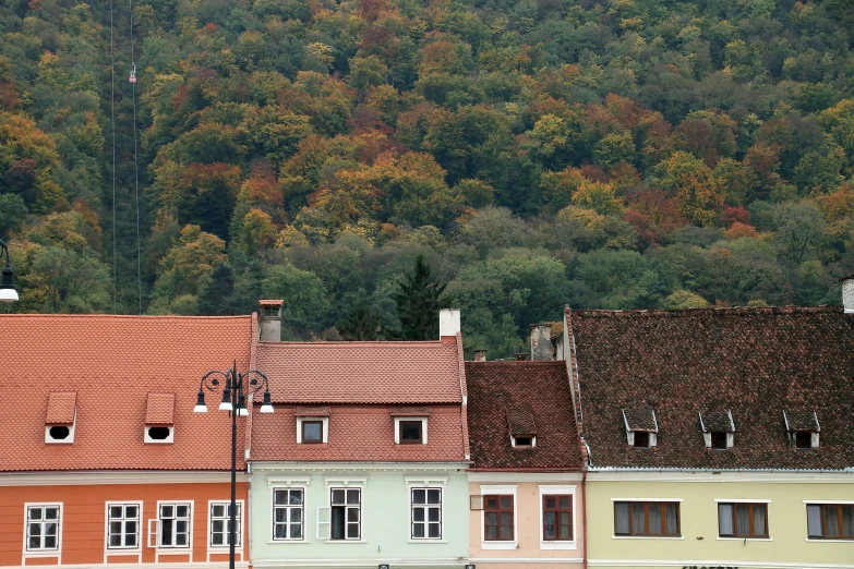 the top of many houses on the side of the road