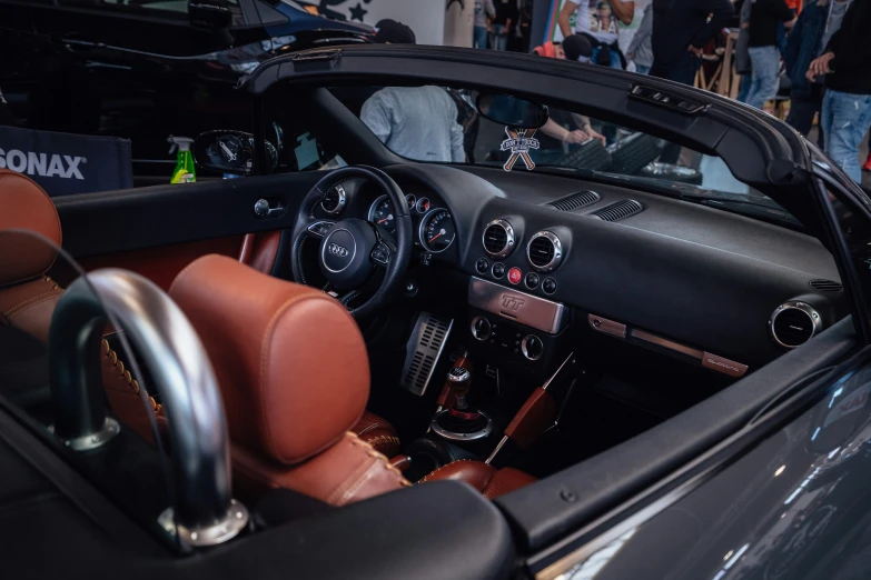 the inside of a car that is in a showroom