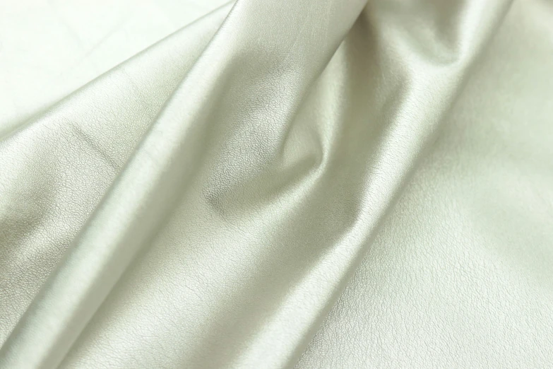 close up s of a plain, white fabric texture