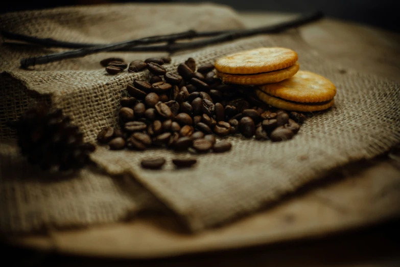 some coffee beans and cookies on a table