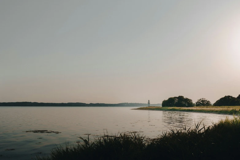 the lake by the park is quiet and peaceful