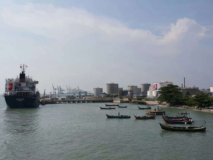 a harbor with several boats in it and on the water