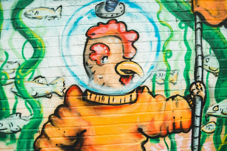 a very detailed mural on a brick wall of a chicken holding a fishing pole