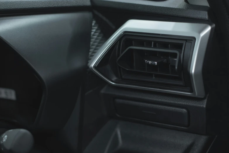 an electronic device inside the center console of a vehicle