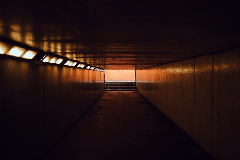 dark po of a tunnel that looks like soing from another location