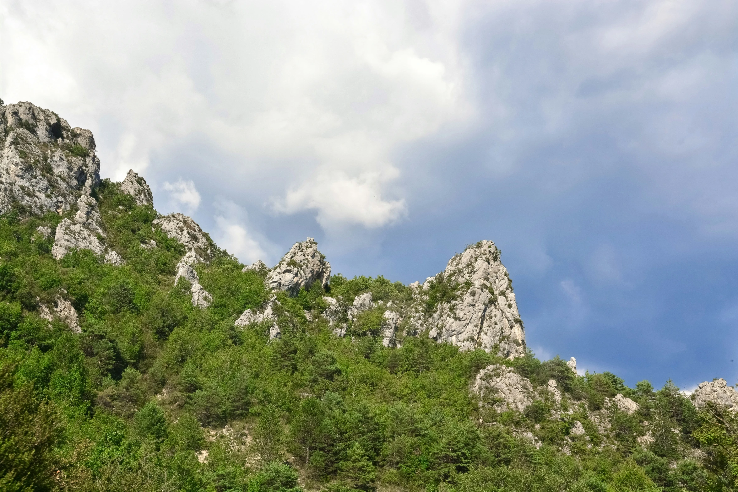 a view of a mountain that looks like it is coming down the mountain side