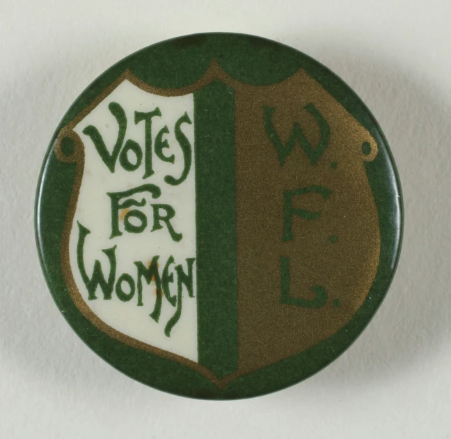 a badge of the vote for women on display