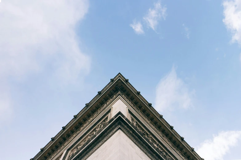 a po of an upward clocktower against the sky