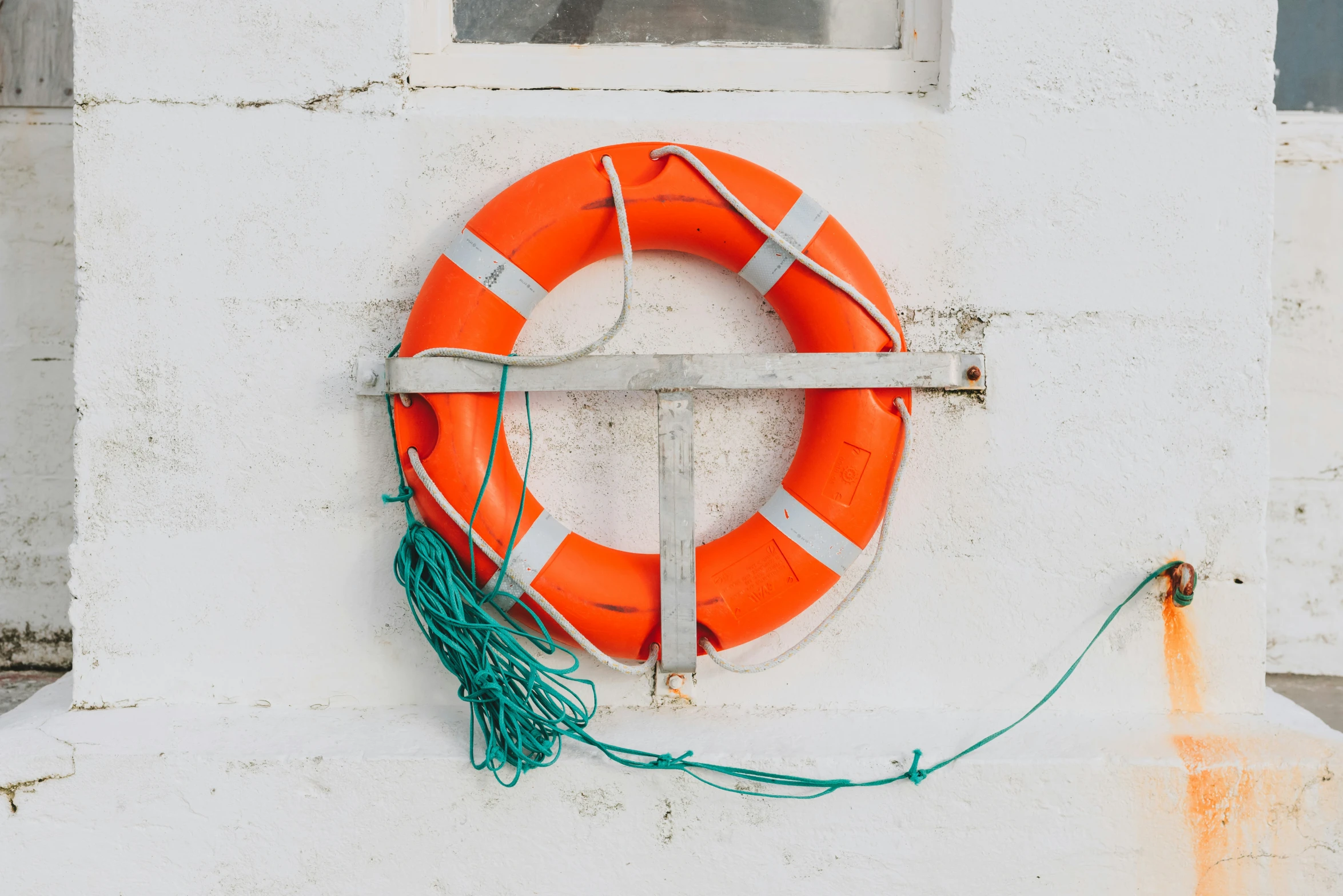 a life raft is attached to the side of a wall