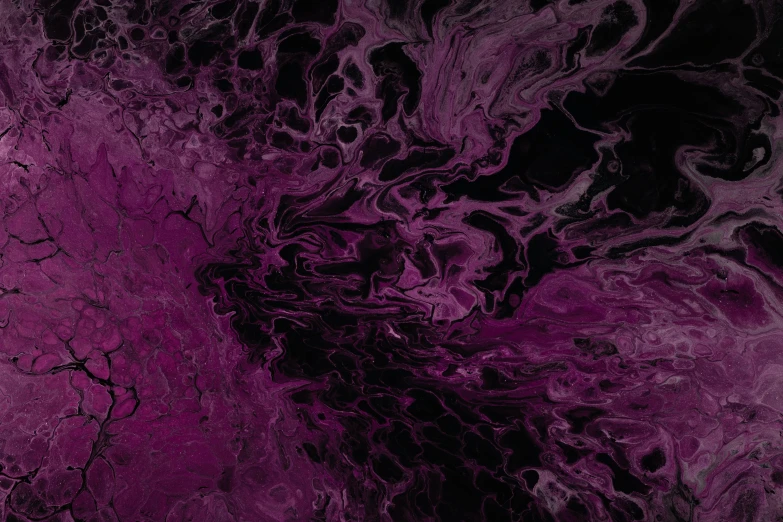 the dark texture of some fluid paint