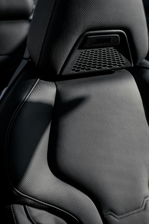 black leather seats with electronic controls in a car
