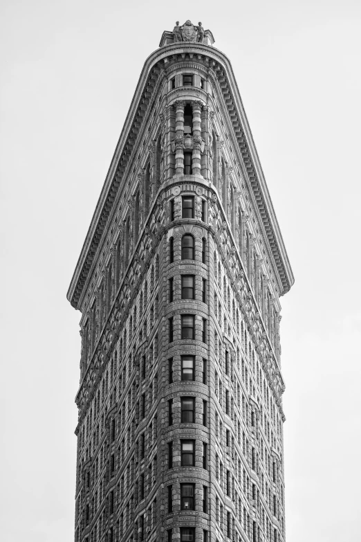 a building with an artistic architectural shape that is tall