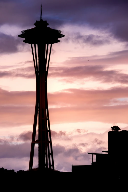 an artistic pograph of the sky and a tower