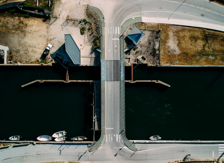a top down view of two bridges on the road