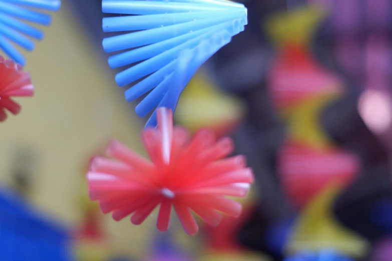 blue and pink origami flower shaped objects