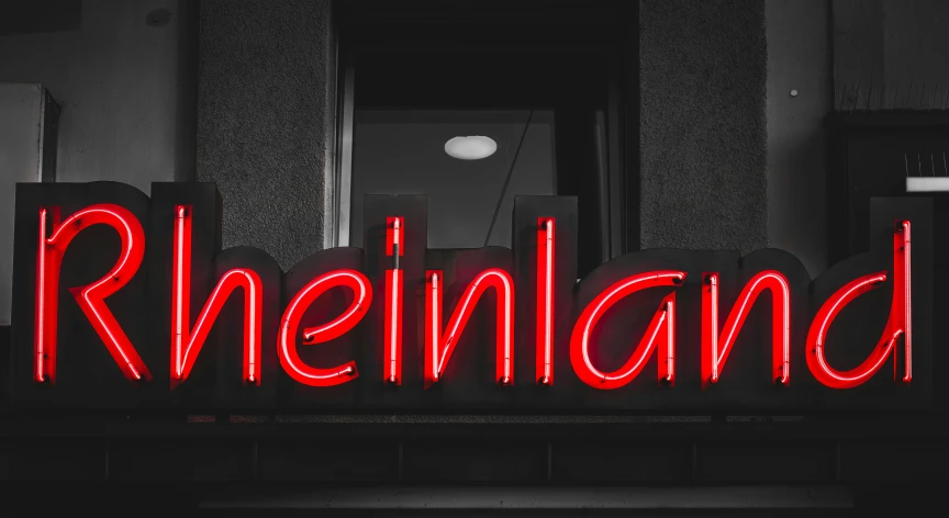 a close up of a neon sign that says rlielland