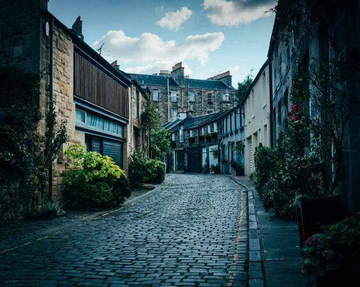 a cobblestone street lined with buildings