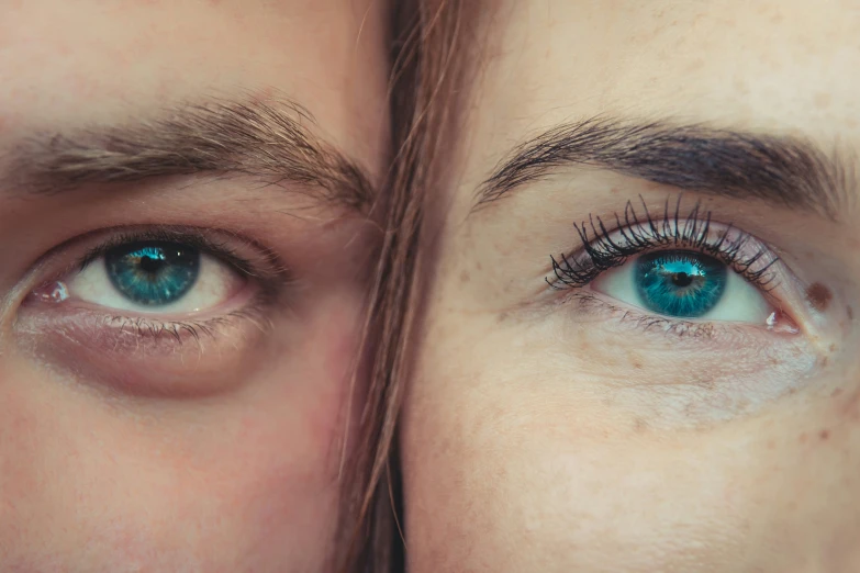 two girls looking at the side while wearing fake lashes