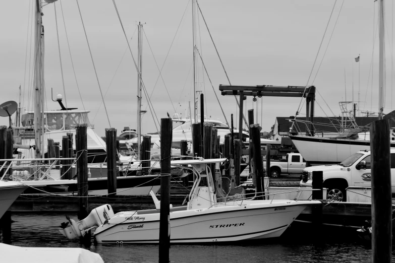 a couple boats are docked in the water