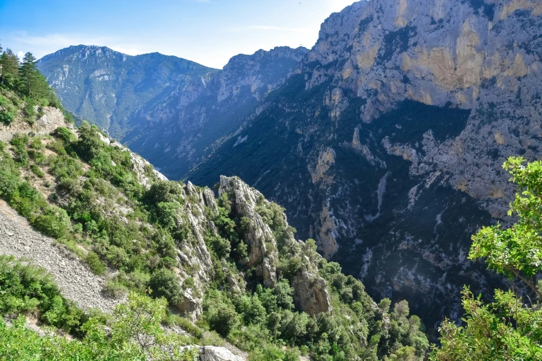 a view of a mountain range that has many mountains