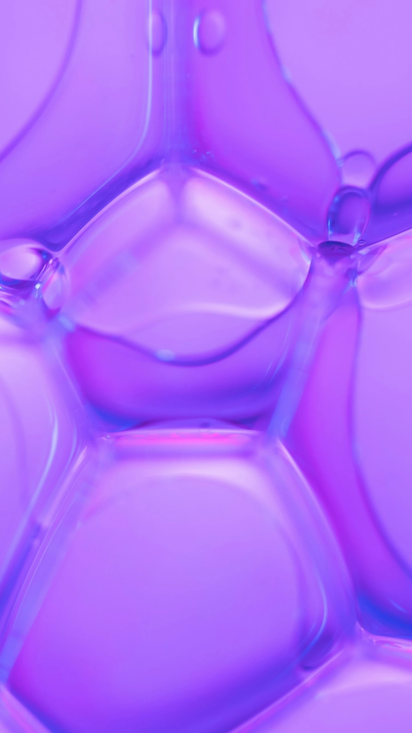 an abstract po of bubbles on a purple surface