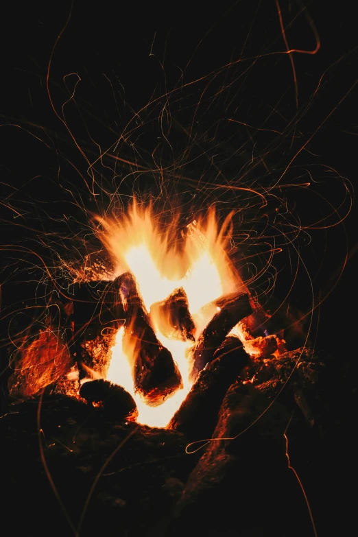 a fire is shown with sparkles on it