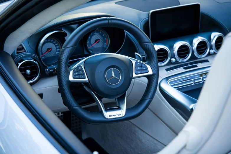 the dashboard of a mercedes car with electronic controls