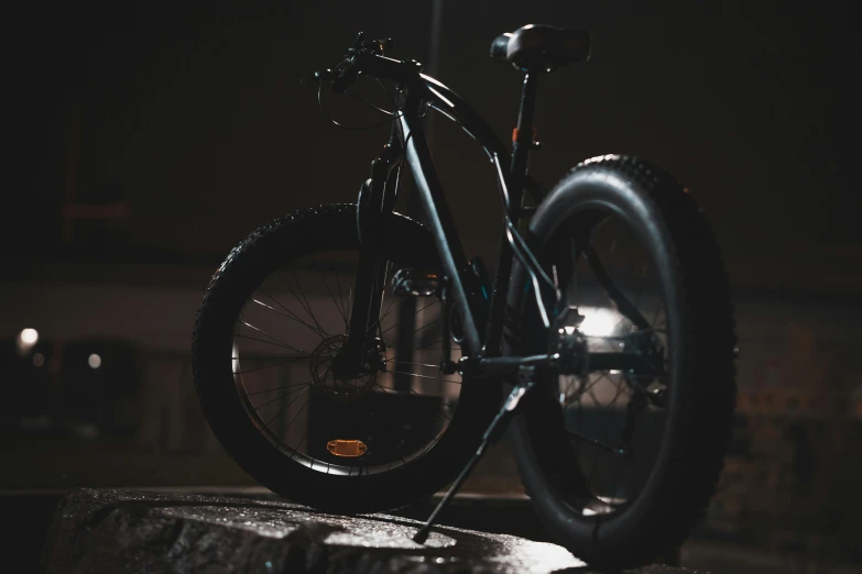 a bike that is sitting on a rock